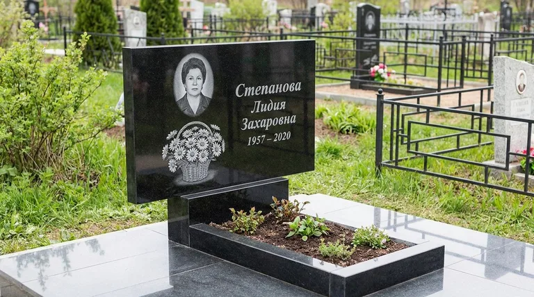 Памятник с гравировкой ромашек — выполненная работа «Степанова» в Иркутске