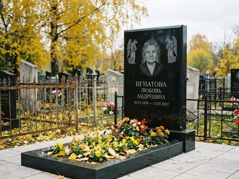 Памятник с гравировкой ангела — гравировка двух ангелов по сторонам портрета, работа «Игнатова» в Иркутске