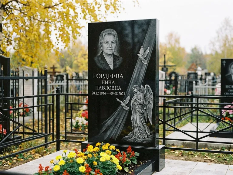 Памятник с гравировкой ангела — гравировка ангела с голубем по диагонали стелы, работа «Гордеева» в Иркутске