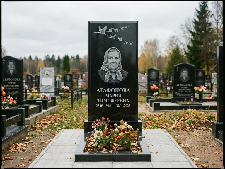 Гравировка журавлей на памятник в Иркутске — памятник из чёрного гранита с гравировкой